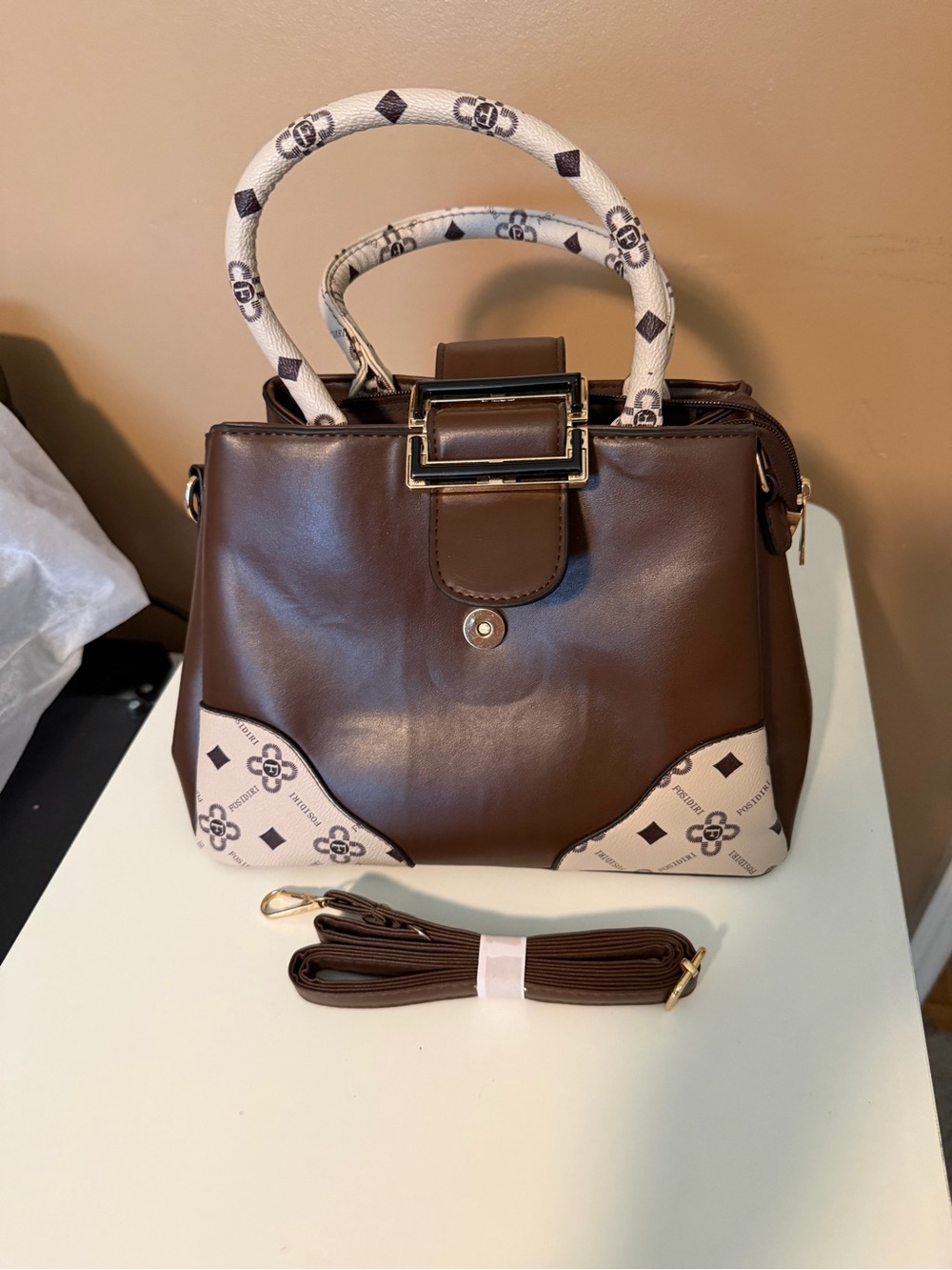 Elegant Brown Top-Handle Satchel with Patterned Accents